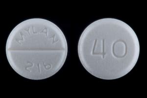 C L 407. . Round white pill 40